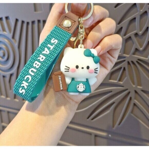 Starbucks Hello Kitty Keychain Green Apron Book Sanrio Collab Strap - Picture 1 of 7